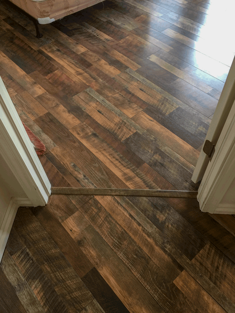 Laminate flooring upgrade in doorway